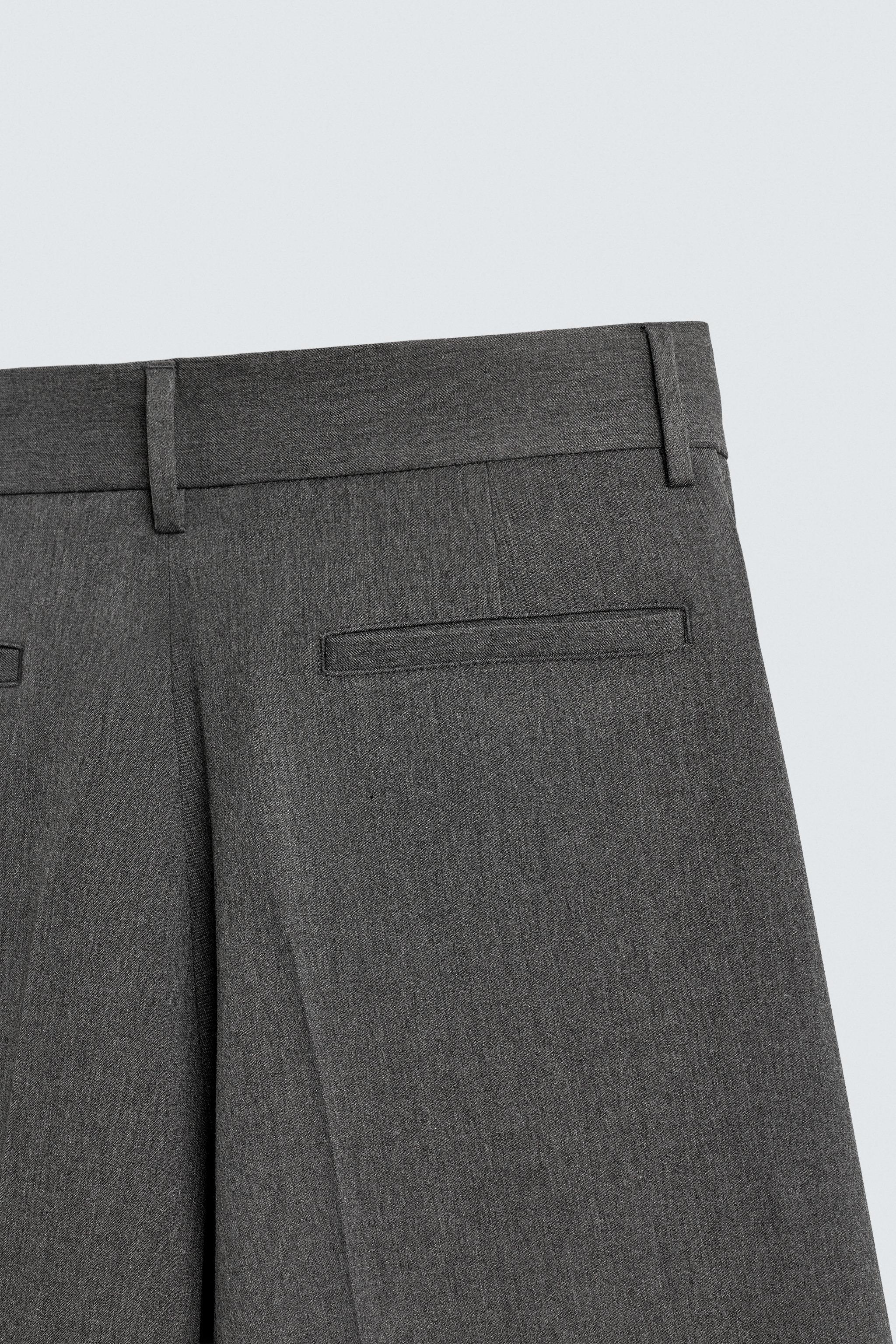 PLEATED WIDE FIT PANTS